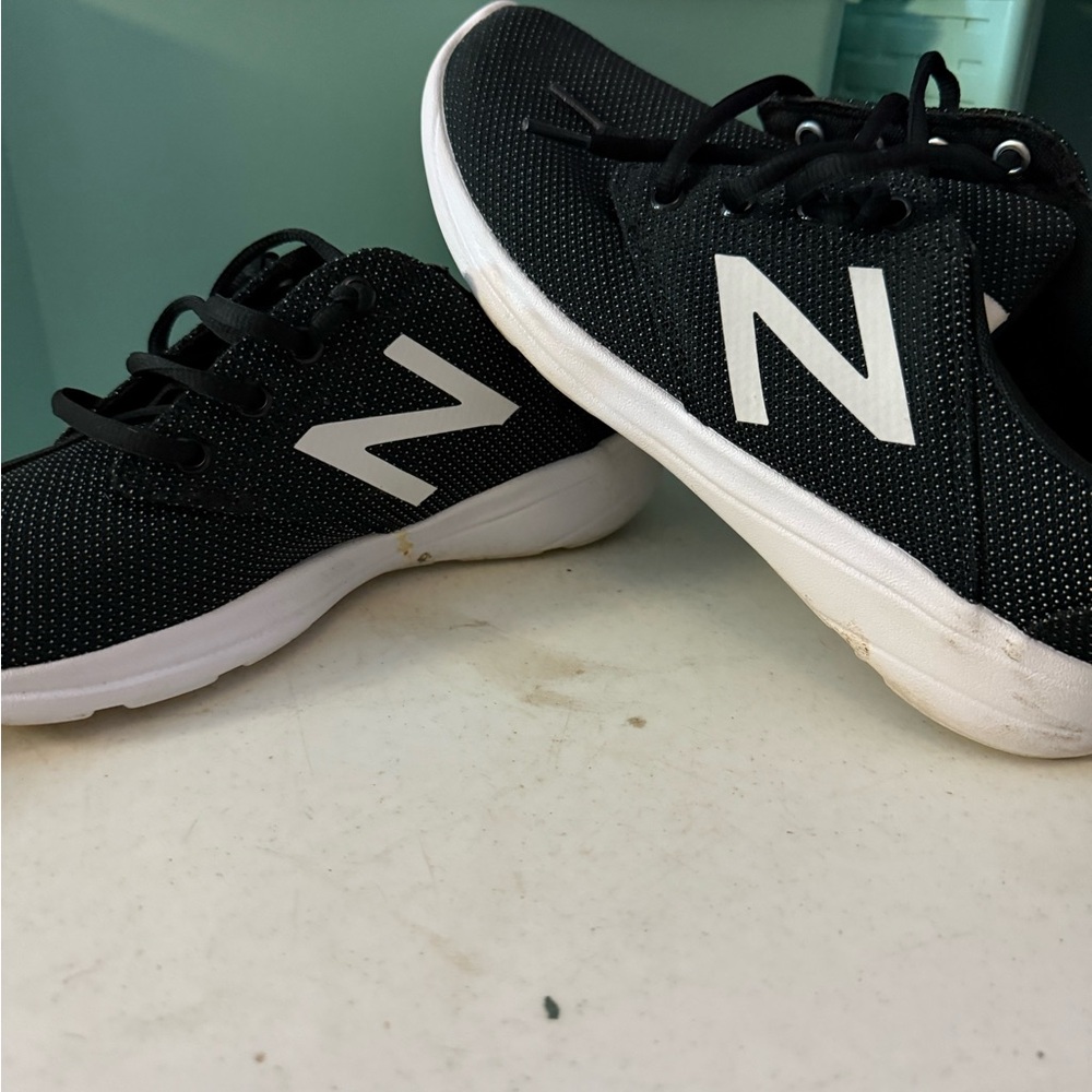 New Balance WOMANS Black and White Sneakers